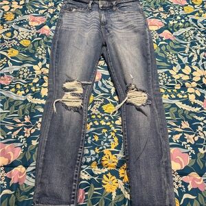Buckle High Rise Distressed Blue Jeans